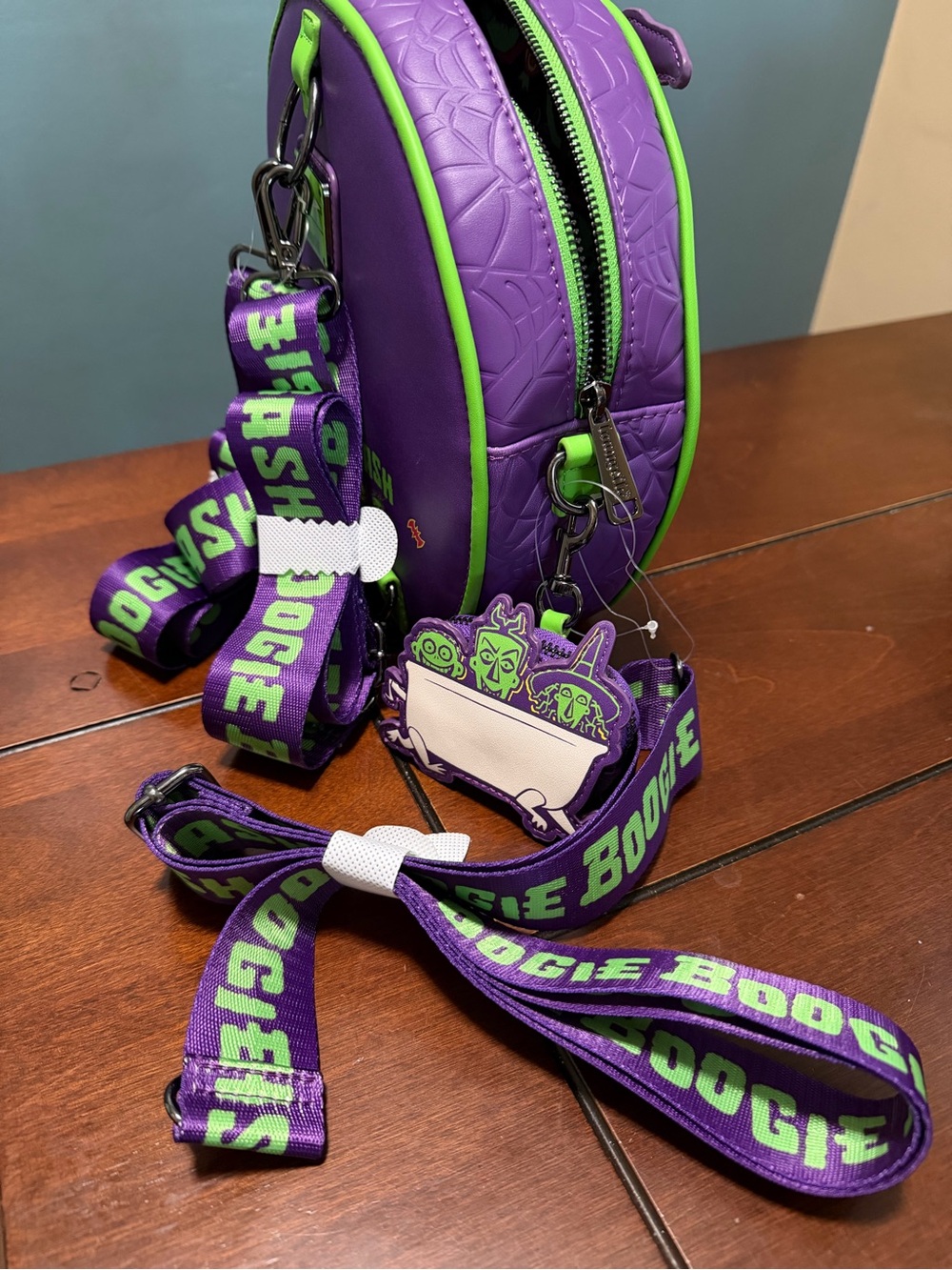 LoungeFly Disney Oogie Boogie Bash 2025 Glow Convertible Crossbody Bag/Backpack - Picture 6 of 7